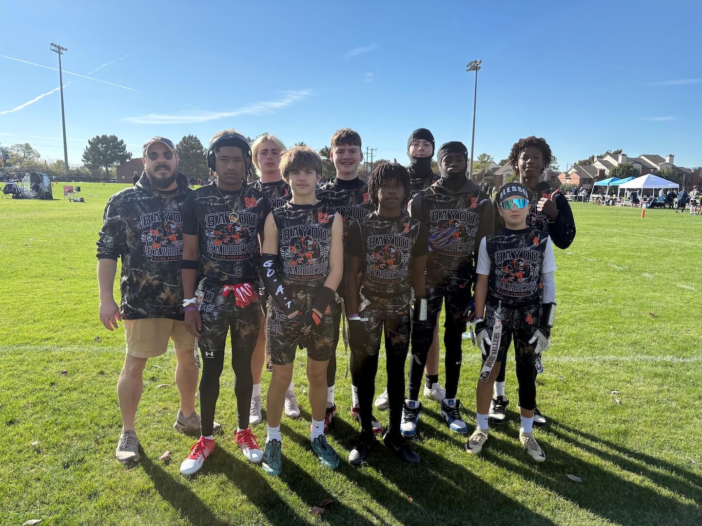 Blake coaching the Bayou Ballers flag football team